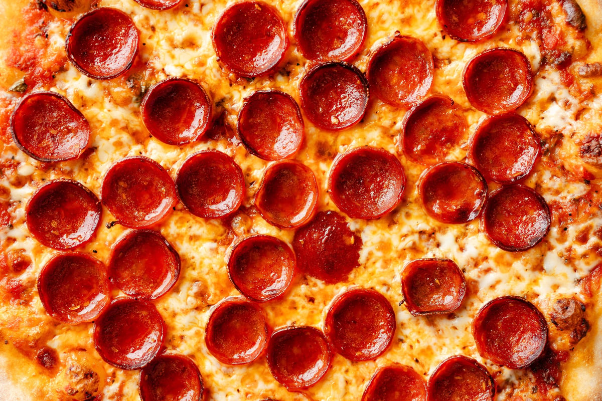 Pepperoni pizza with crispy cups of pepperoni on house sauce and mozzarella